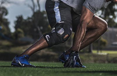 Man wearing custom knee brace during sport